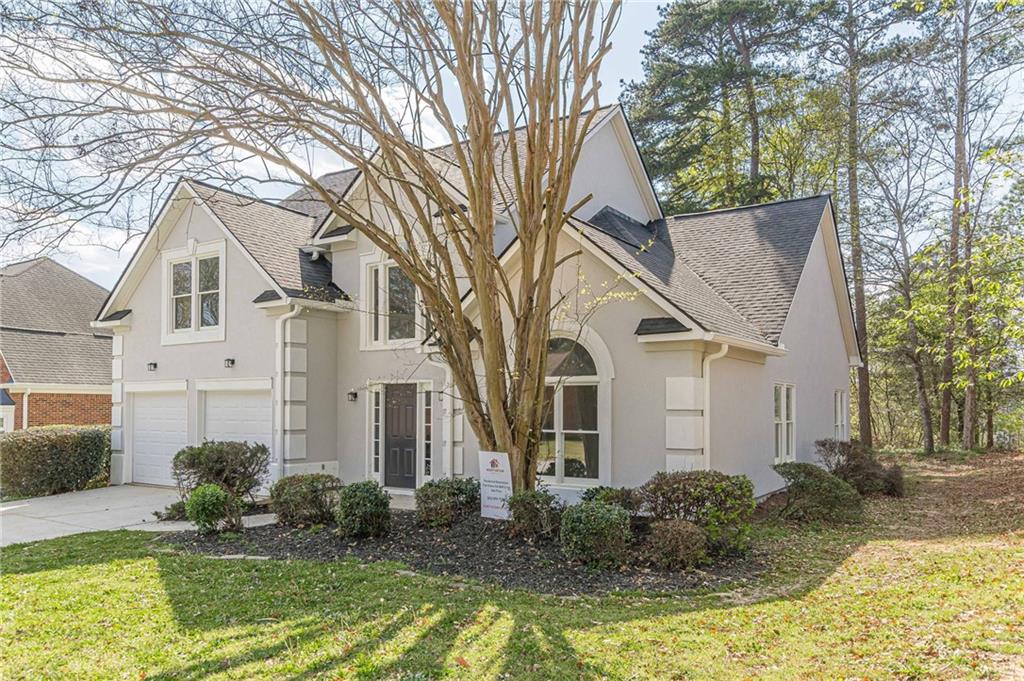 775 Southland Pass Stone Mountain, GA 30087 - Photo 4 of 76 a view of house with yard and swimming pool