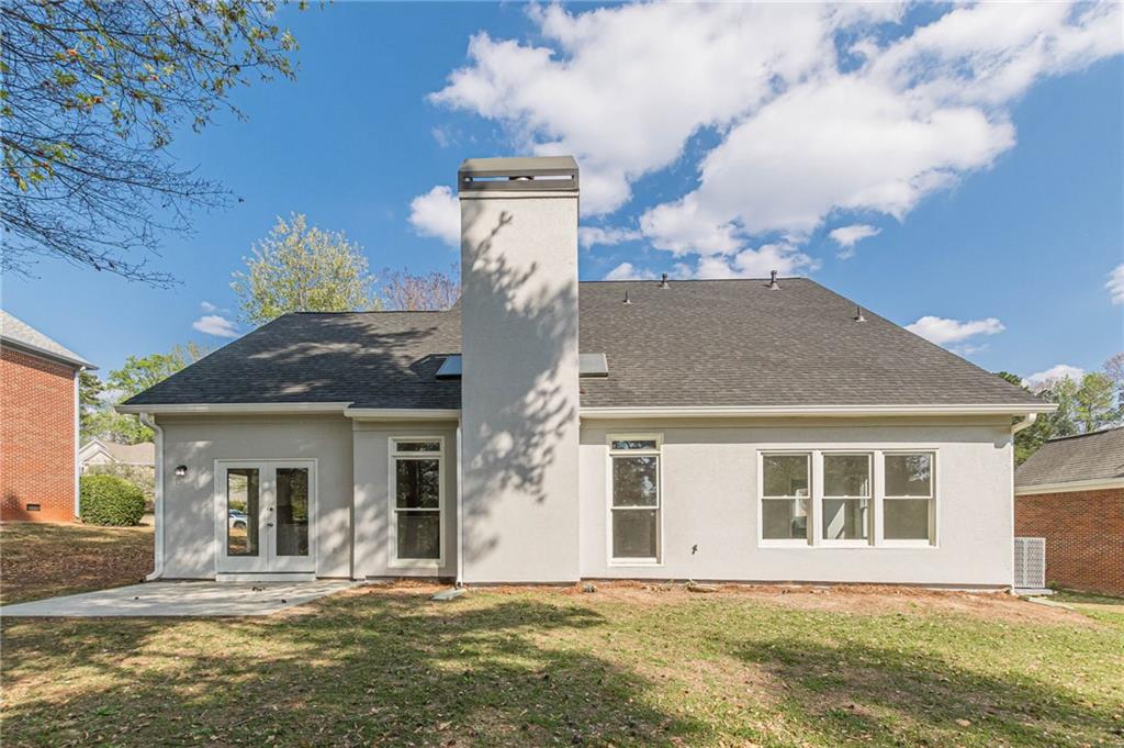 775 Southland Pass Stone Mountain, GA 30087 - Photo 50 of 76 a front view of a house with a yard