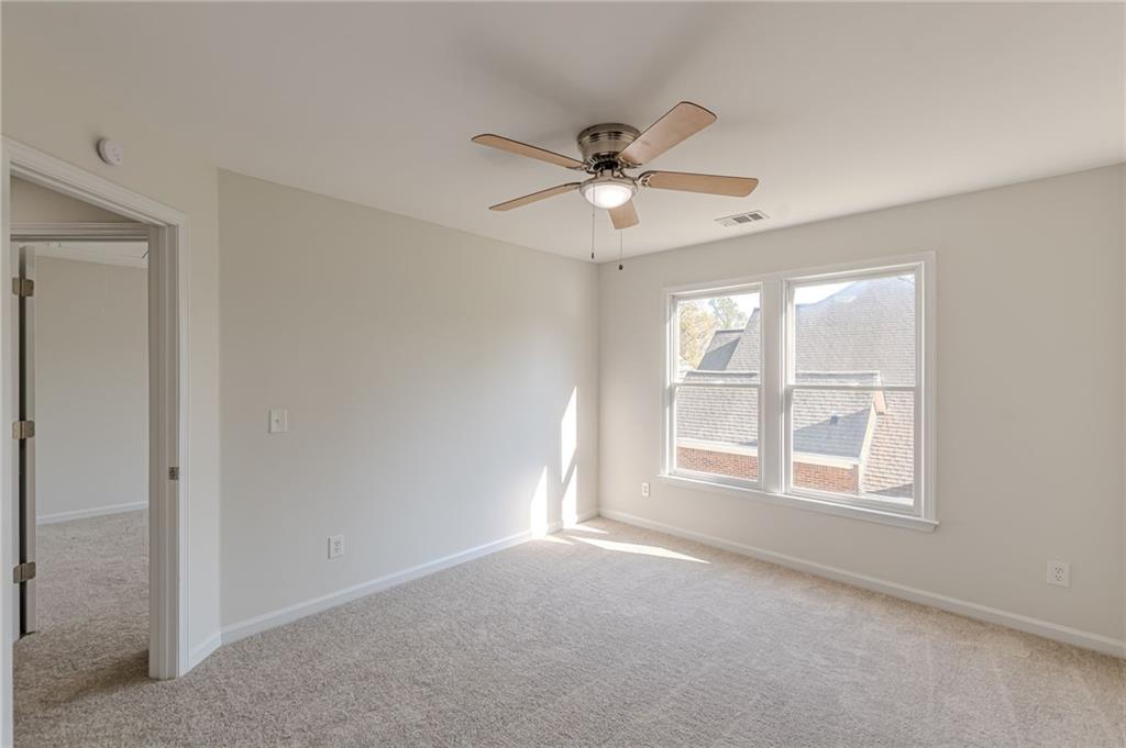 775 Southland Pass Stone Mountain, GA 30087 - Photo 55 of 76 a view of an empty room with a window