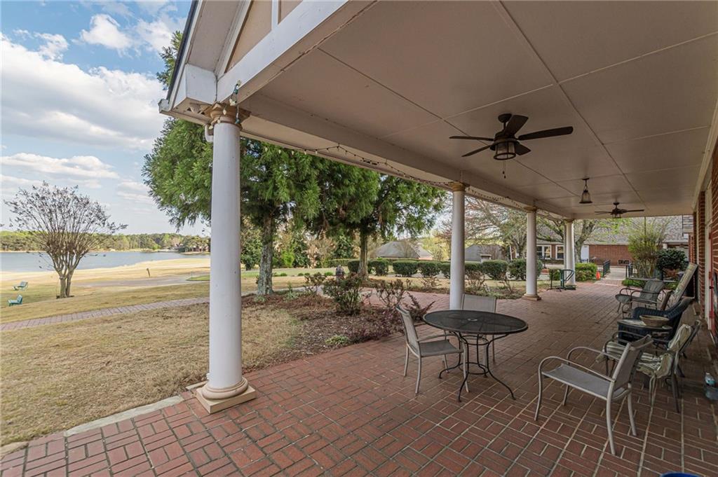 775 Southland Pass Stone Mountain, GA 30087 - Photo 67 of 76 a view of a porch with chairs and backyard