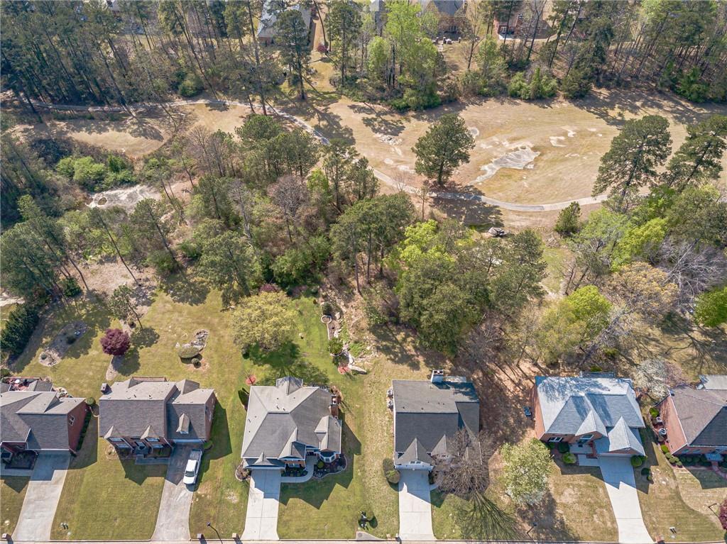 775 Southland Pass Stone Mountain, GA 30087 - Photo 75 of 76 an aerial view of residential houses with outdoor space