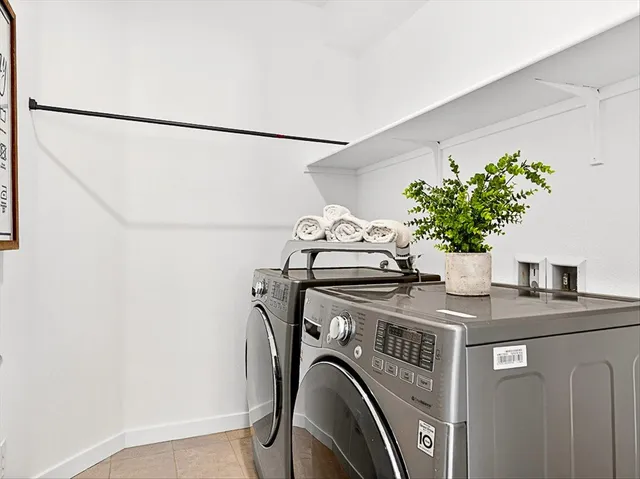 a bedroom with a bed and a mirror