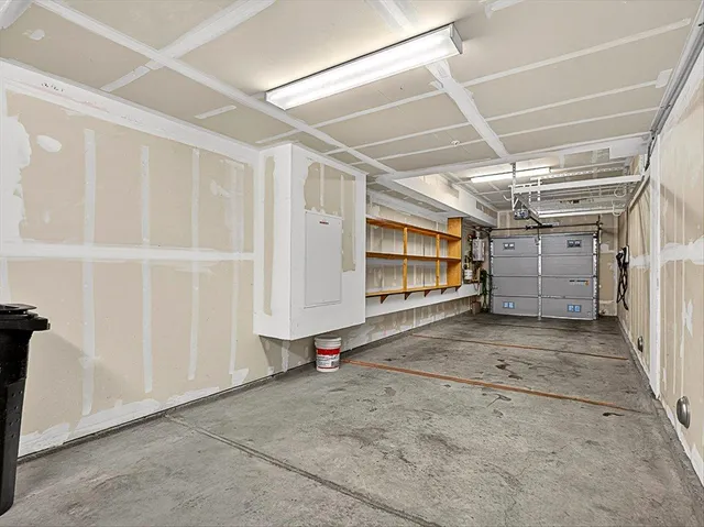 a view of a chairs and table in a patio