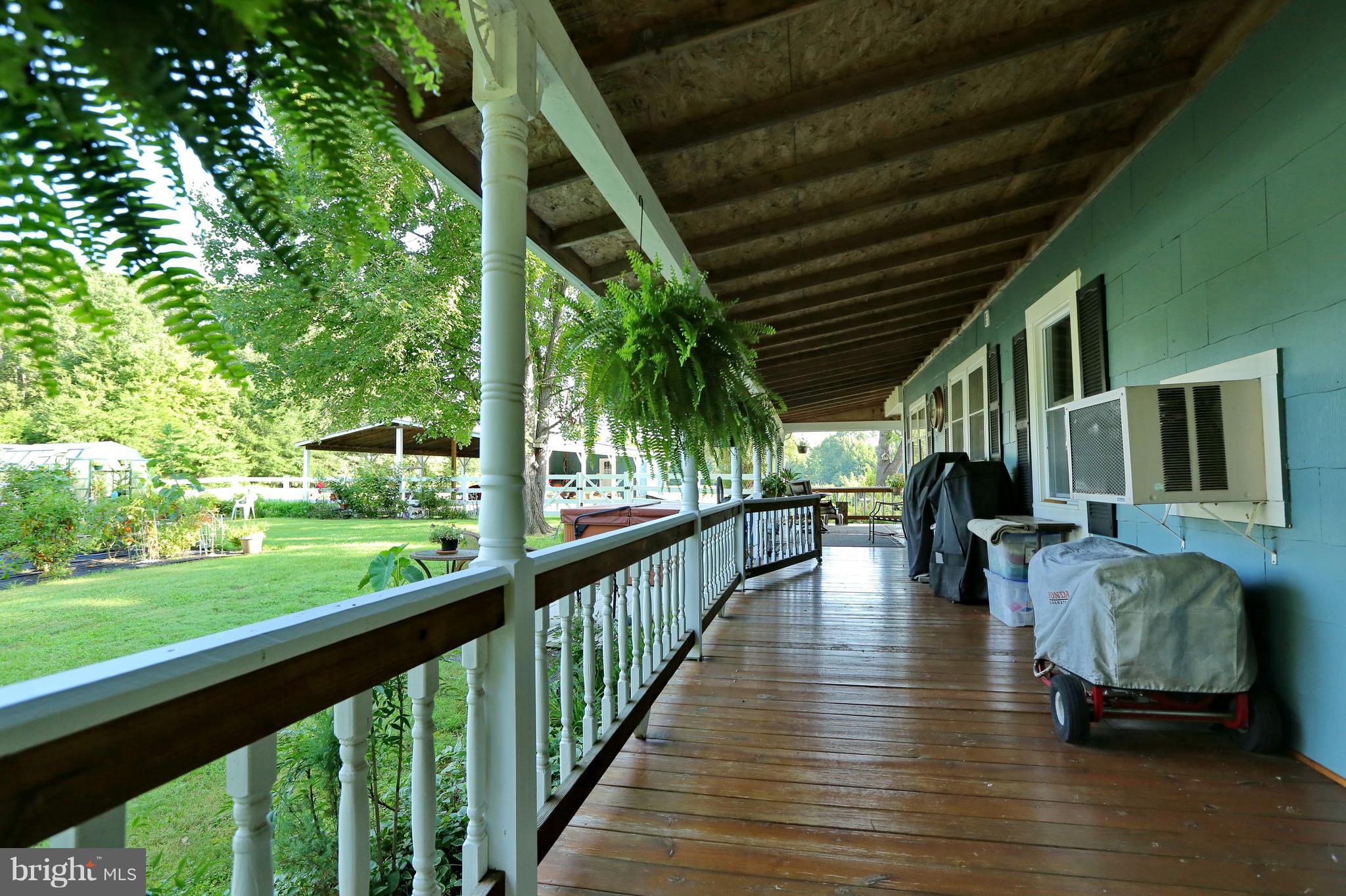 2010 Liverpool Point Road Nanjemoy, MD 20662 - Photo 23 of 35 Wrap Around Porch