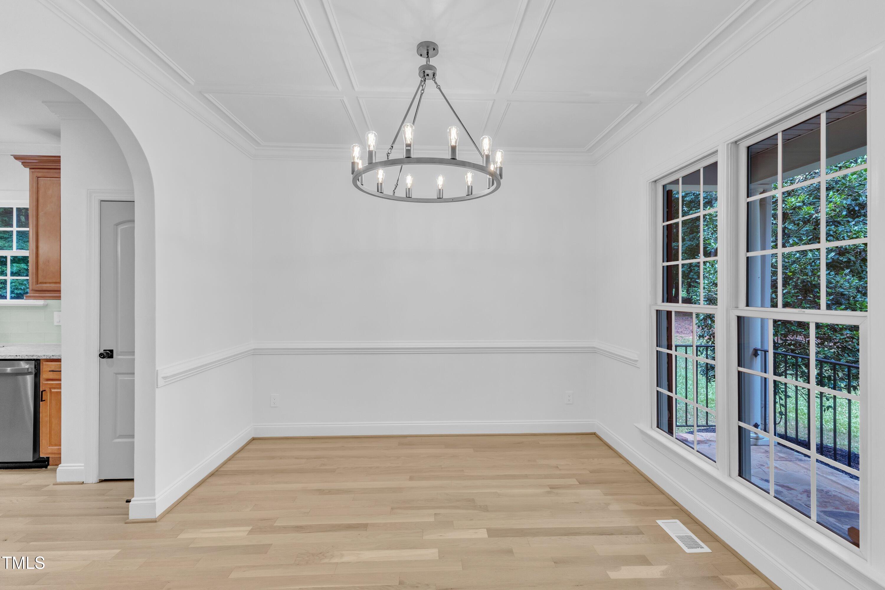 2103 Troys Trail Franklinton, NC 27525 - Photo 17 of 53 a view of a room with wooden floor and a window