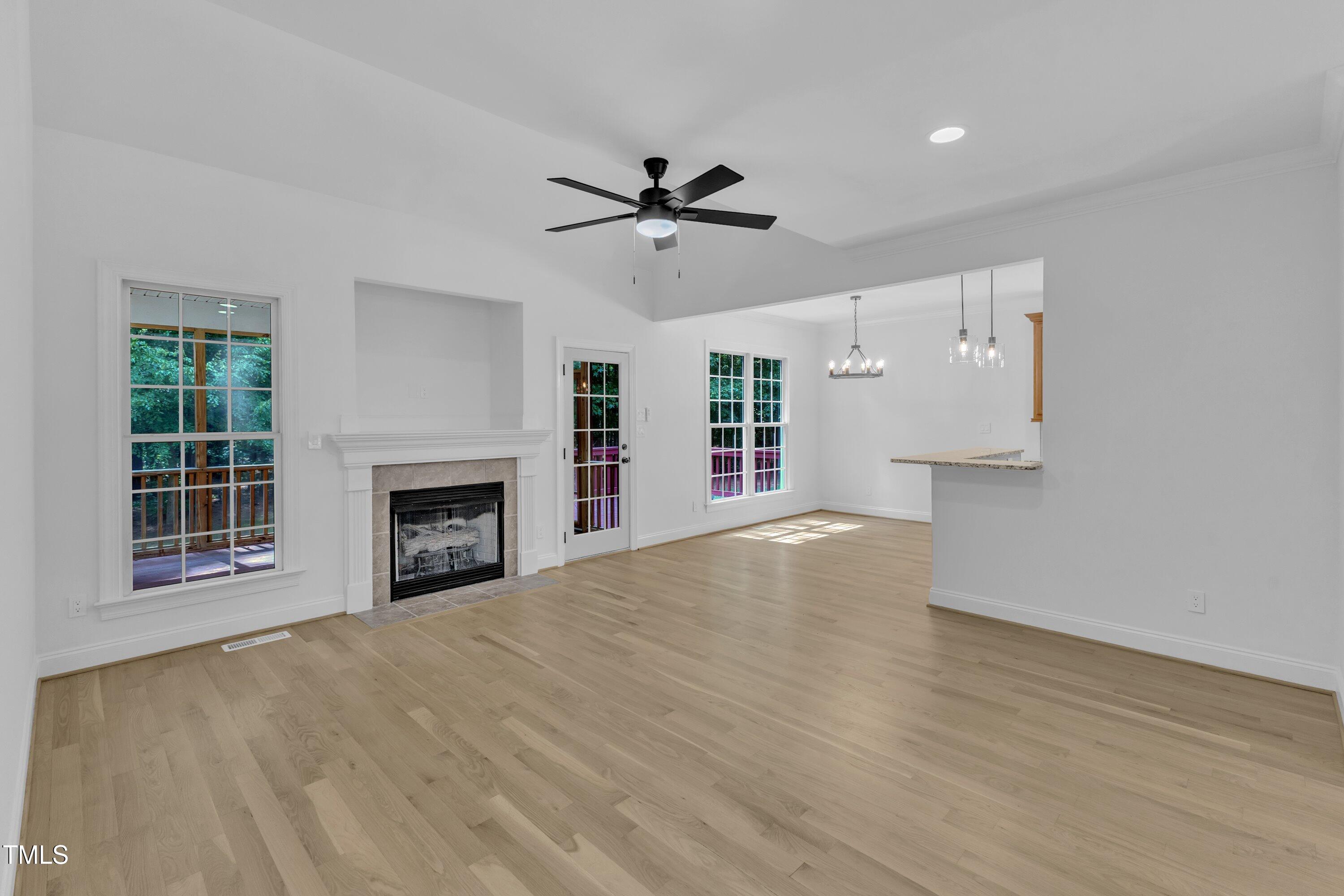 2103 Troys Trail Franklinton, NC 27525 - Photo 18 of 53 a view of empty room with a fireplace and window