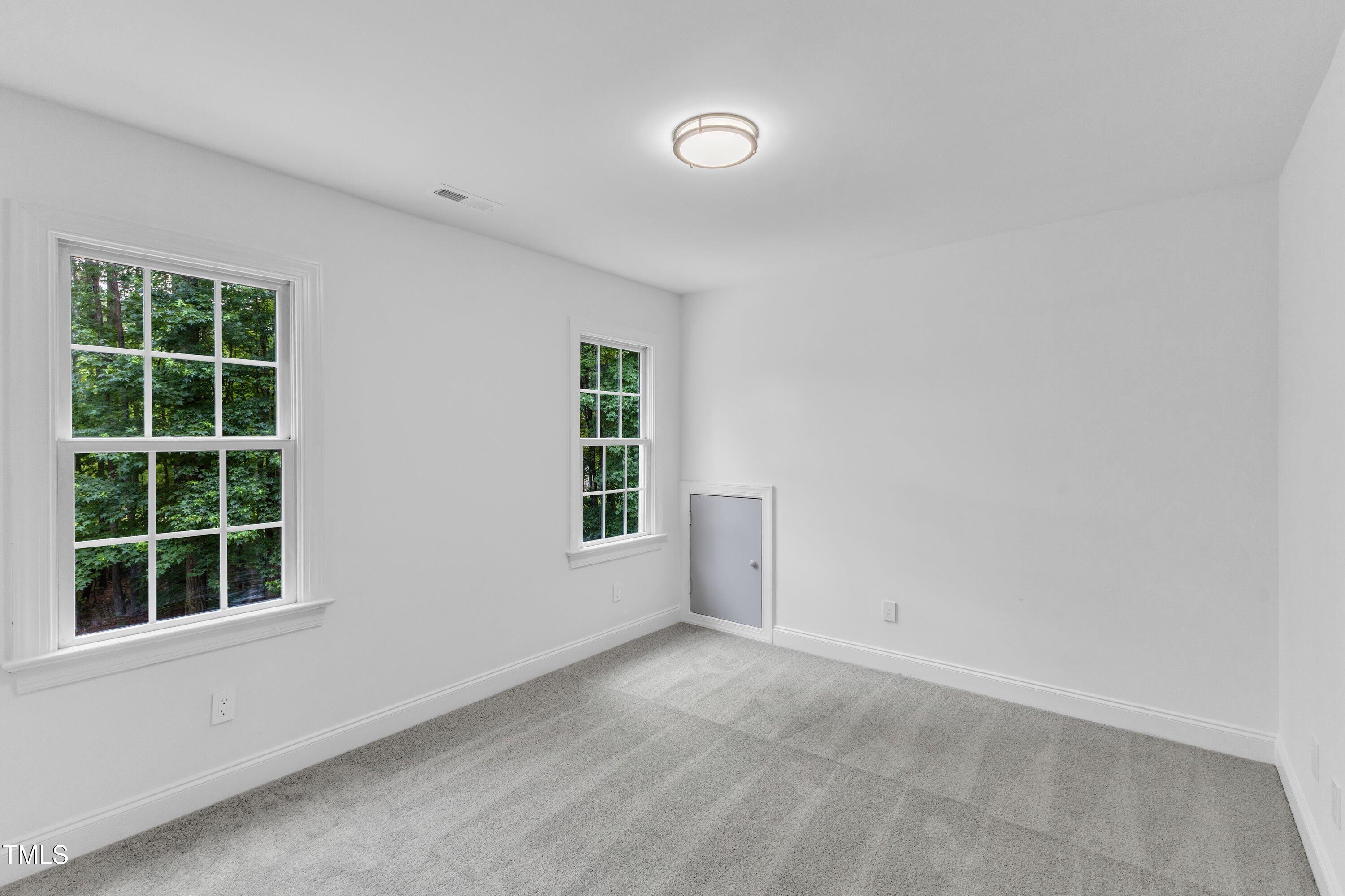 2103 Troys Trail Franklinton, NC 27525 - Photo 30 of 53 an empty room with a window