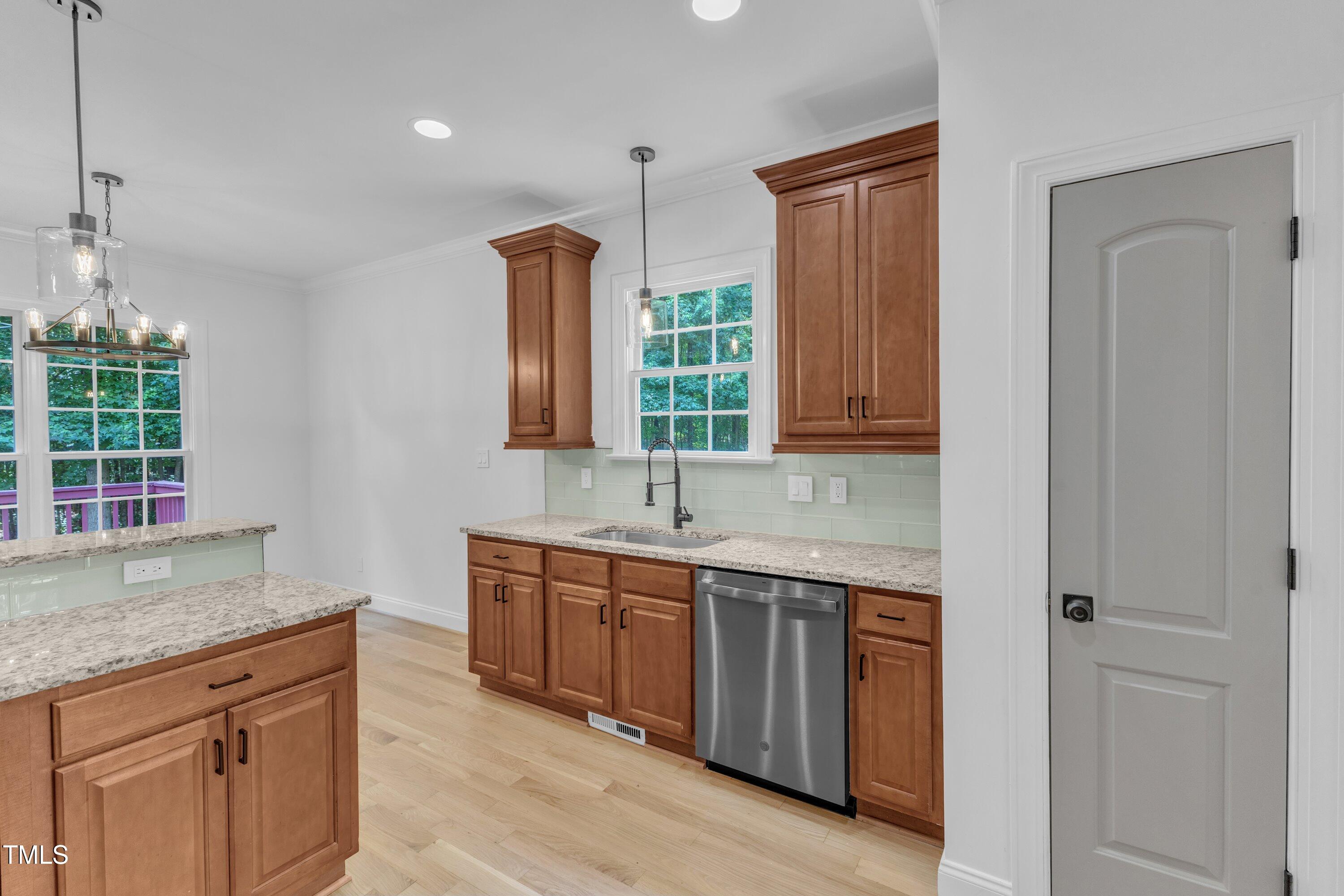 2103 Troys Trail Franklinton, NC 27525 - Photo 10 of 53 a kitchen with a sink and cabinets