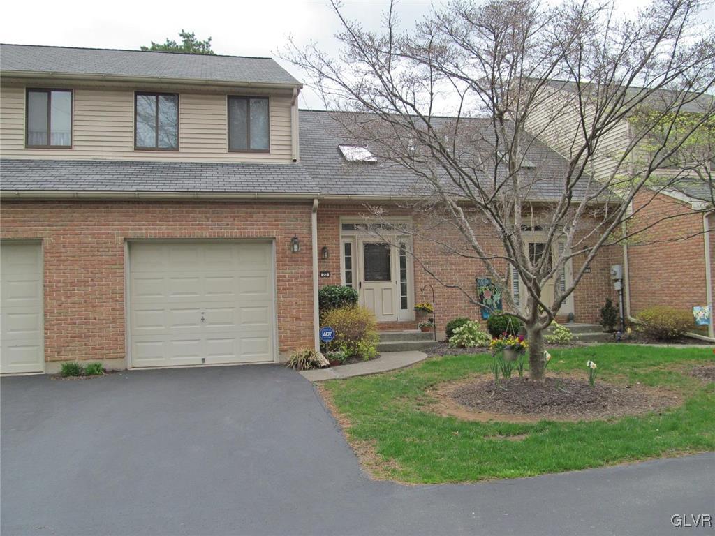 1201 Butztown Road, Unit 22 Bethlehem, PA 18017 - Photo 1 of 23 a front view of a house with garden
