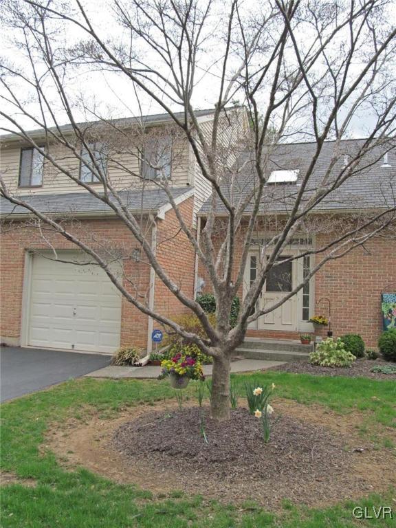 1201 Butztown Road, Unit 22 Bethlehem, PA 18017 - Photo 2 of 23 a view of a house with a yard