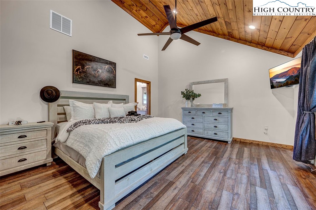 428 Cloud Spring Drive Sugar Mountain, NC 28604 - Photo 34 of 45 a bedroom with a bed and a dresser
