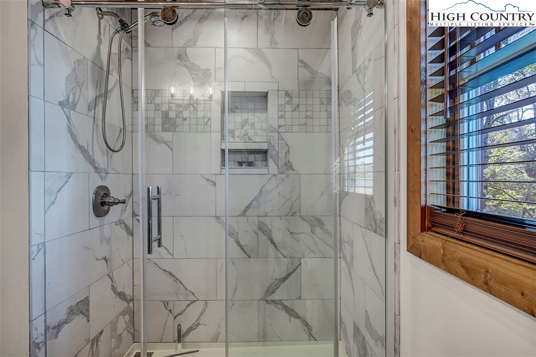 428 Cloud Spring Drive Sugar Mountain, NC 28604 - Photo 39 of 45 a bathroom with a shower