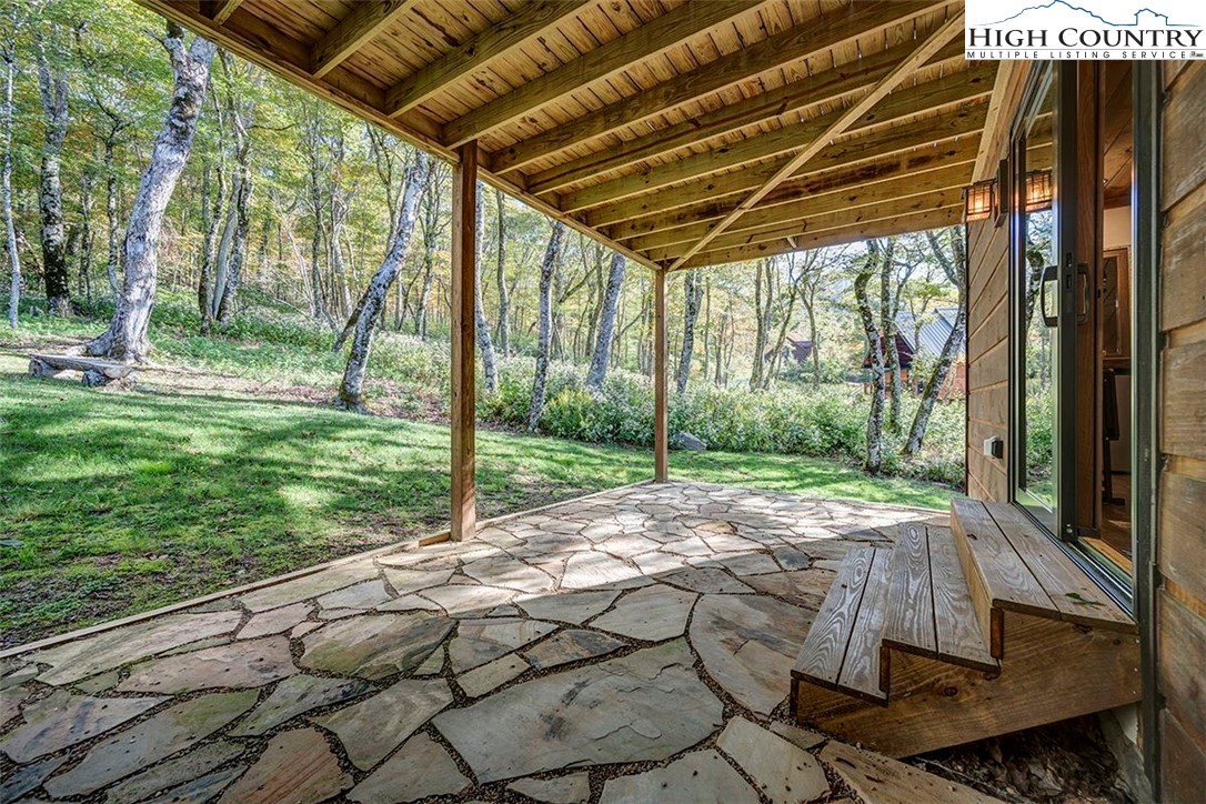 428 Cloud Spring Drive Sugar Mountain, NC 28604 - Photo 41 of 45 a view of yard with patio