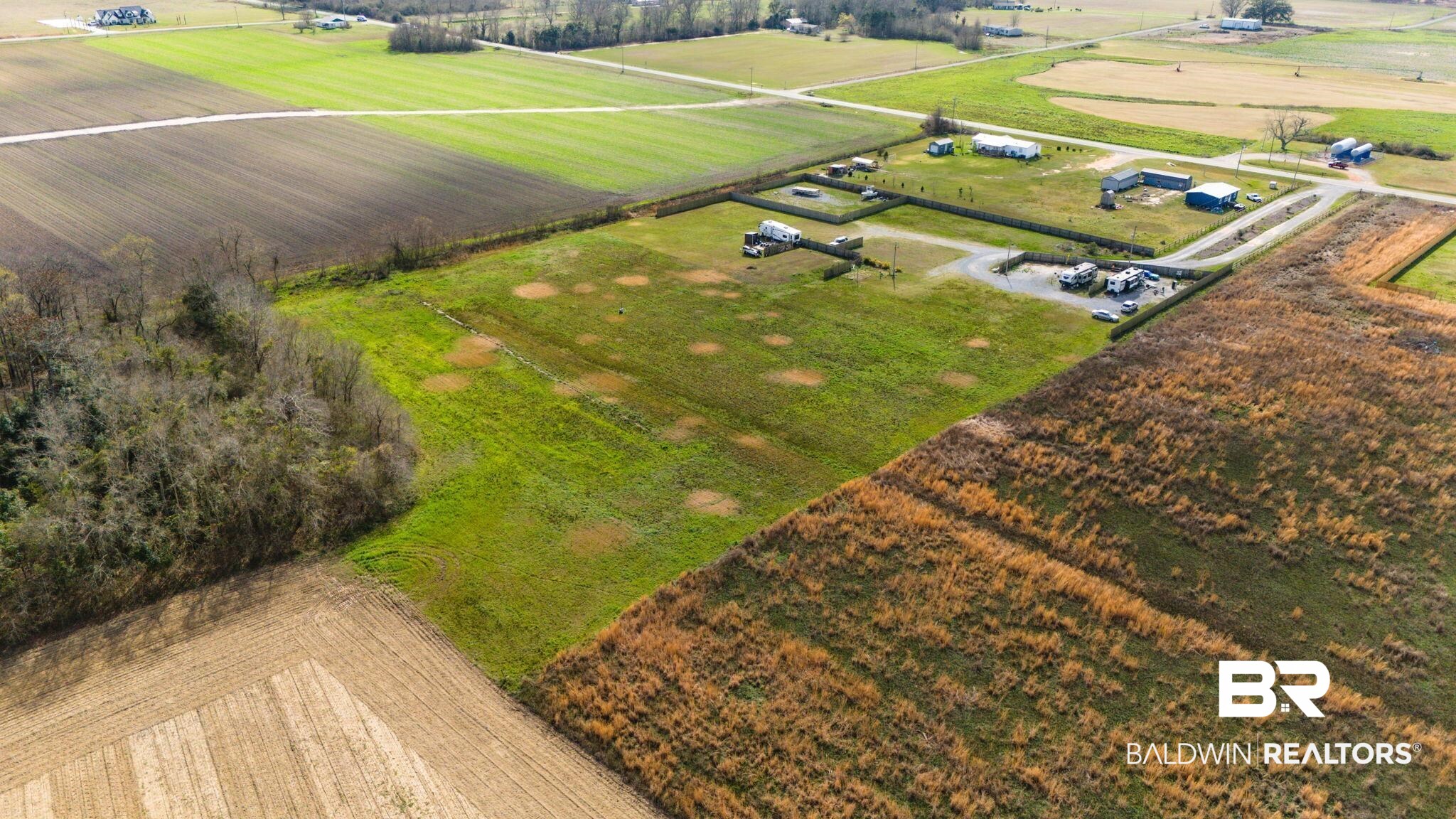 7826 County Road 19 Foley, AL 36535 - Photo 8 of 11 Overview of rural landscape featuring rows of crops