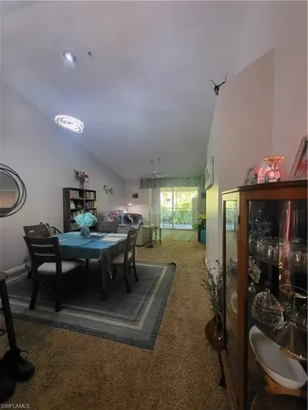 a view of swimming pool and lounge chair