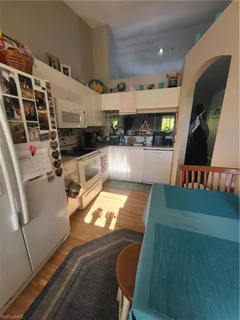 a view of a swimming pool with a yard