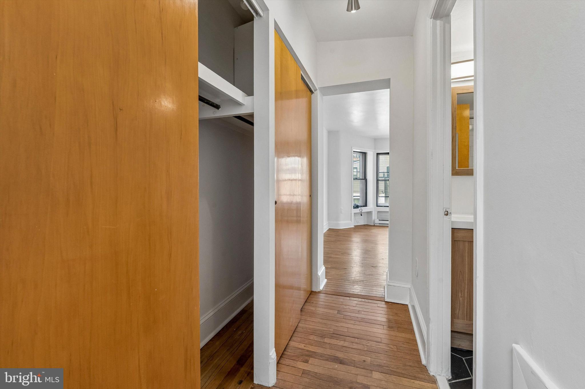 2105 Green Street, Unit 3R Philadelphia, PA 19130 - Photo 11 of 11 a view of a hallway with wooden floor
