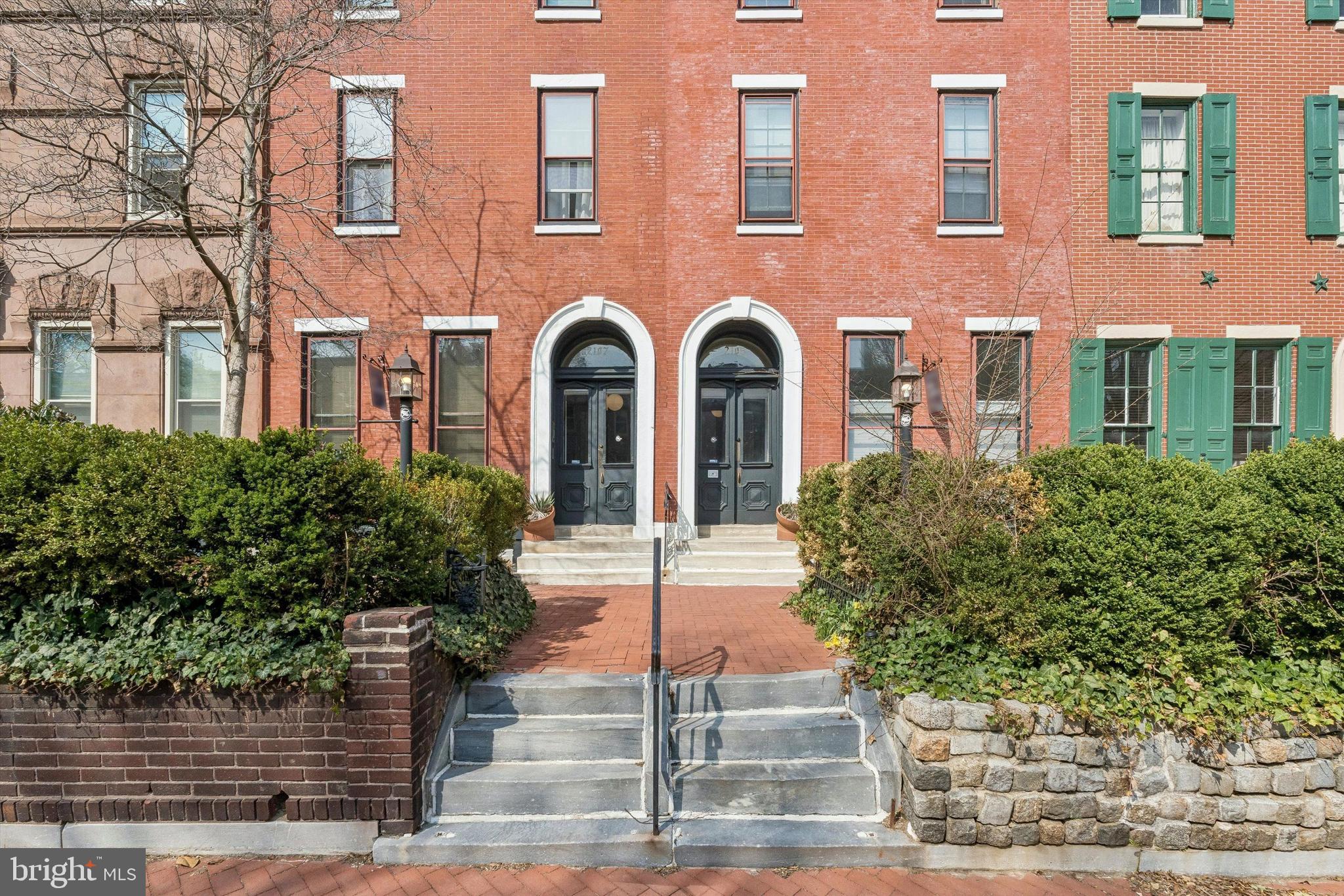 2105 Green Street, Unit 3R Philadelphia, PA 19130 - Photo 2 of 11 a front view of a multi story residential apartment building