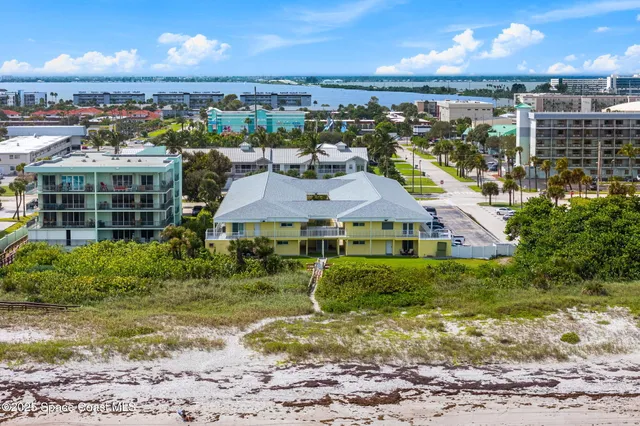 a view of an ocean and a building