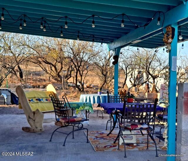 35700 South Cedar Creek Road Arivaca, AZ 85601 - Photo 7 of 44 a view of chairs and tables in the roof deck