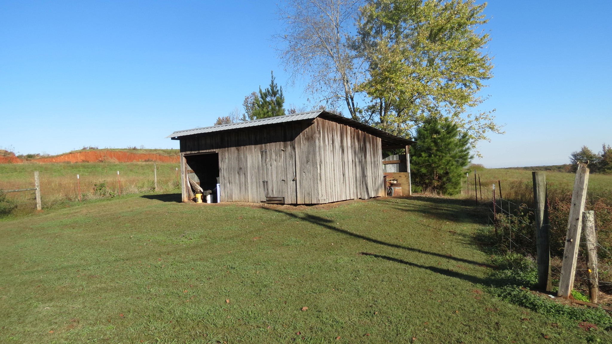 562 Roach Road Decaturville, TN 38329 - Photo 2 of 31 a view of outdoor space and yard