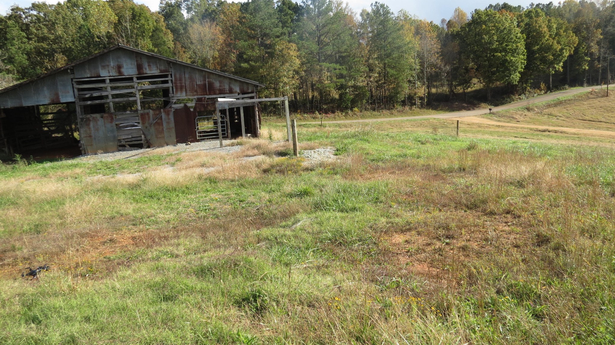 562 Roach Road Decaturville, TN 38329 - Photo 29 of 31 a front view of a house with a yard