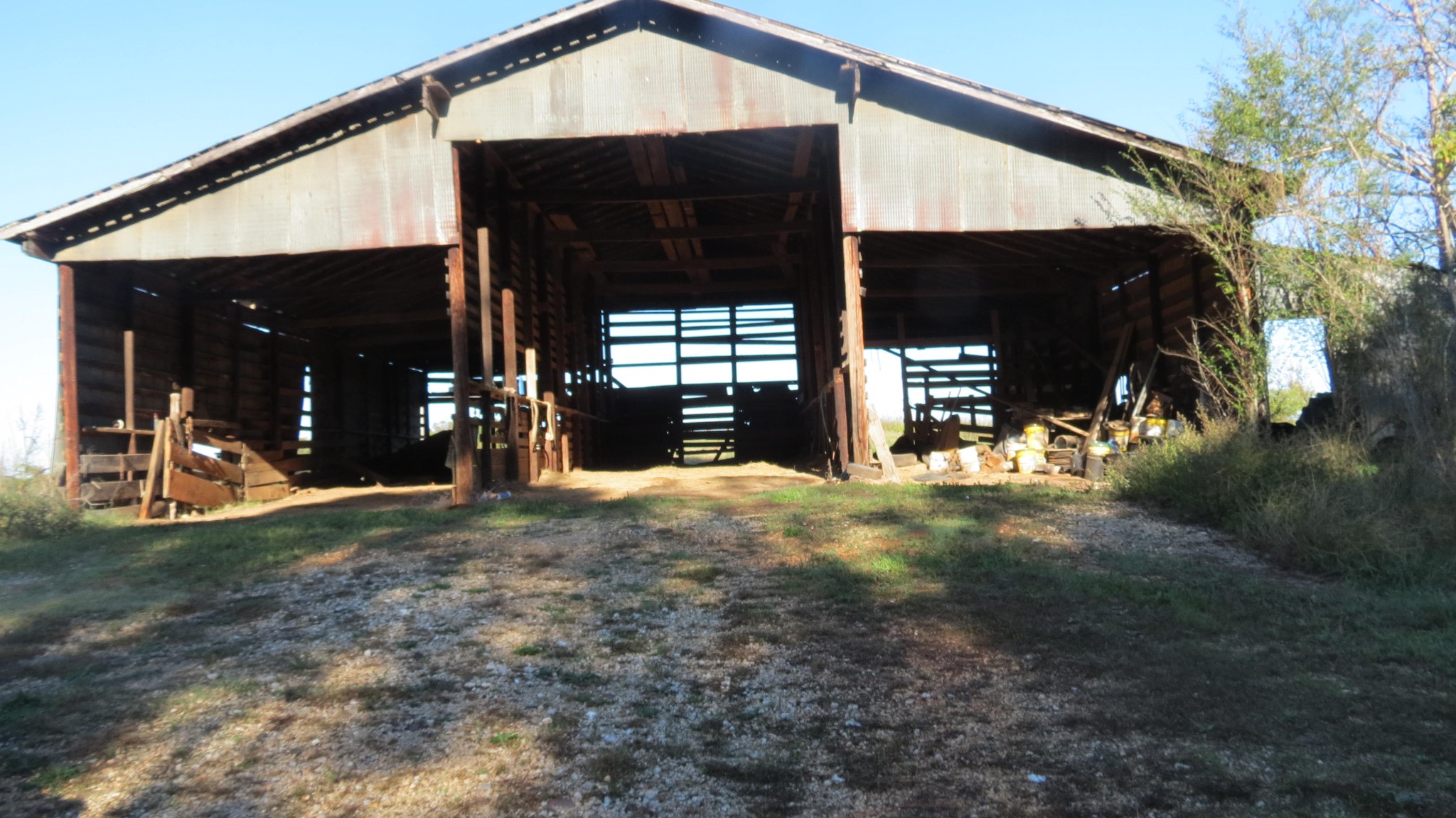 562 Roach Road Decaturville, TN 38329 - Photo 8 of 31 a view of a house with backyard porch and garden