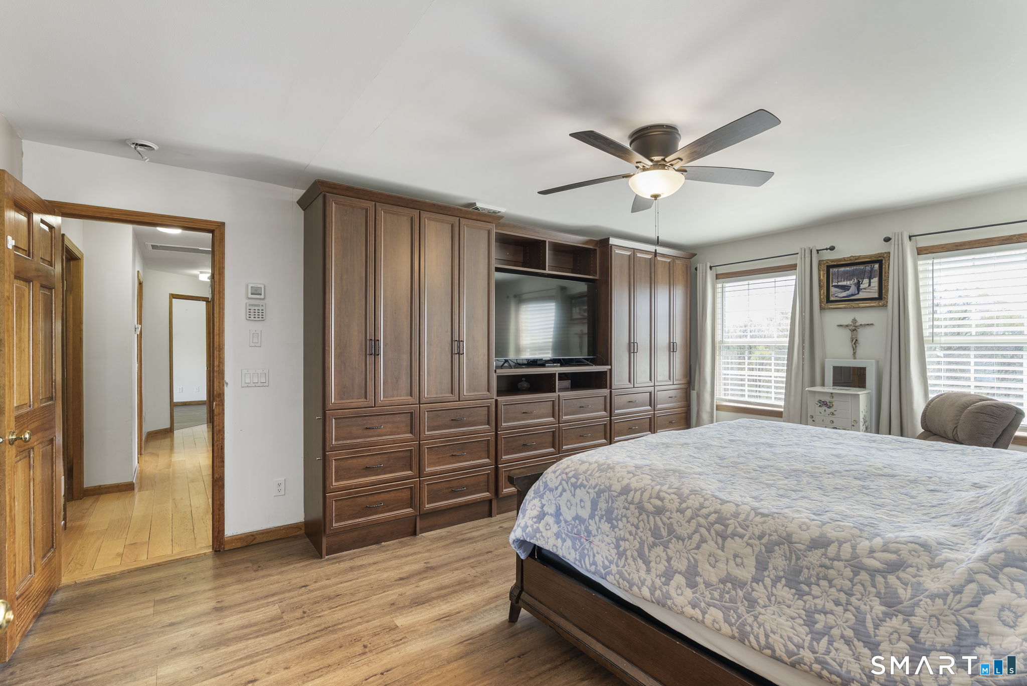 341 High Street Extension Thomaston, CT 06787 - Photo 17 of 39 a bedroom with a bed and a flat screen tv