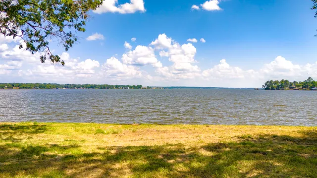 a view of a swimming pool with an ocean view