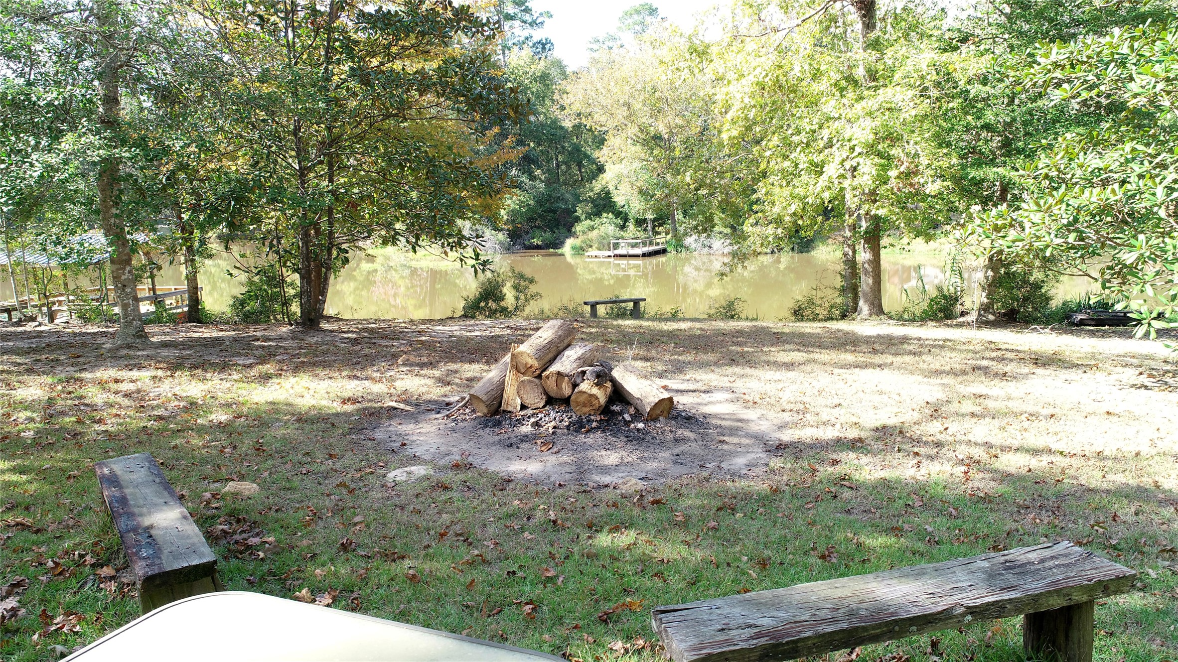 630 Hillbilly Heaven Road Livingston, TX 77351 - Photo 17 of 17 a view of a yard with furniture