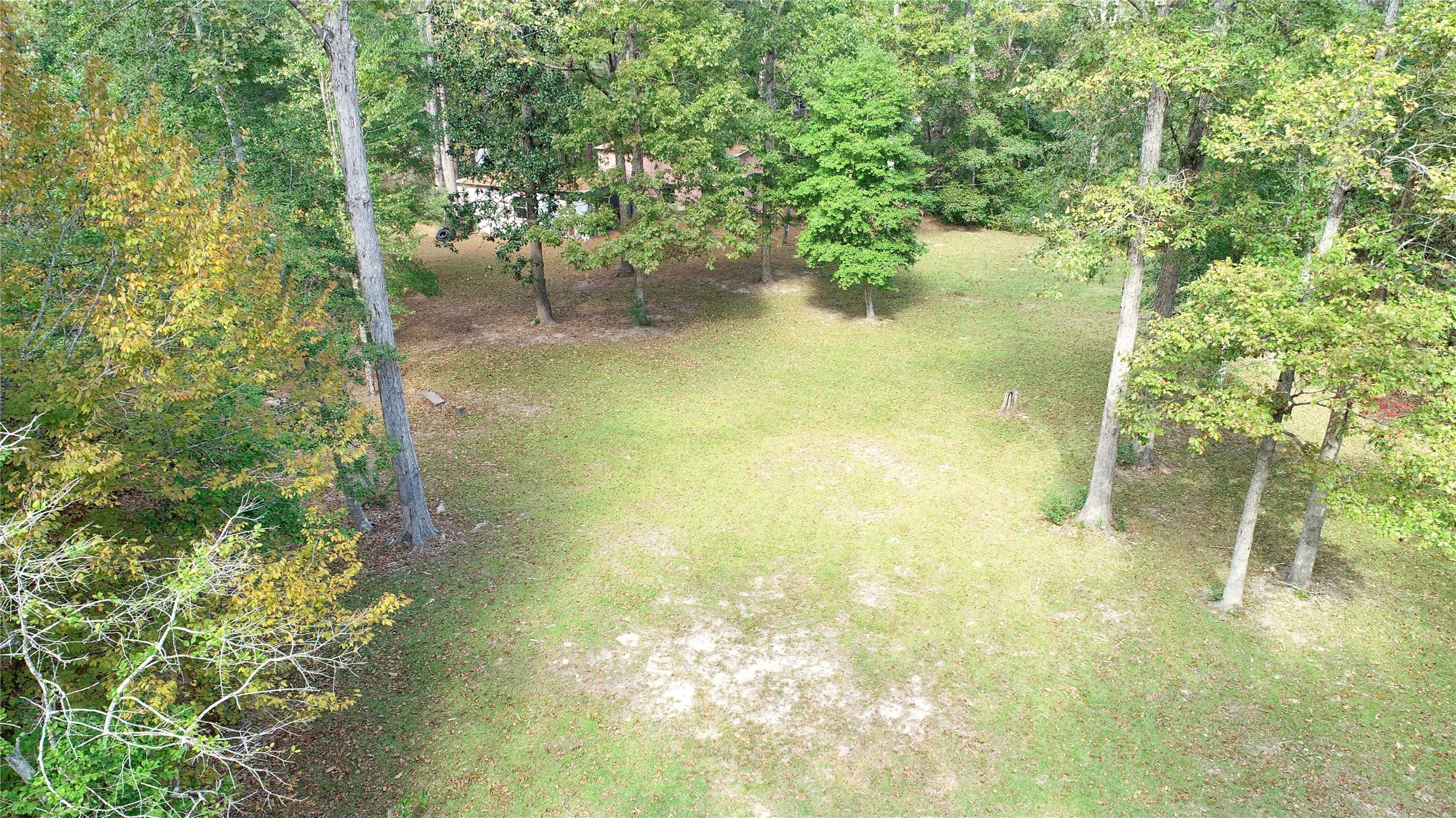 630 Hillbilly Heaven Road Livingston, TX 77351 - Photo 7 of 17 a view of a lake view with houses