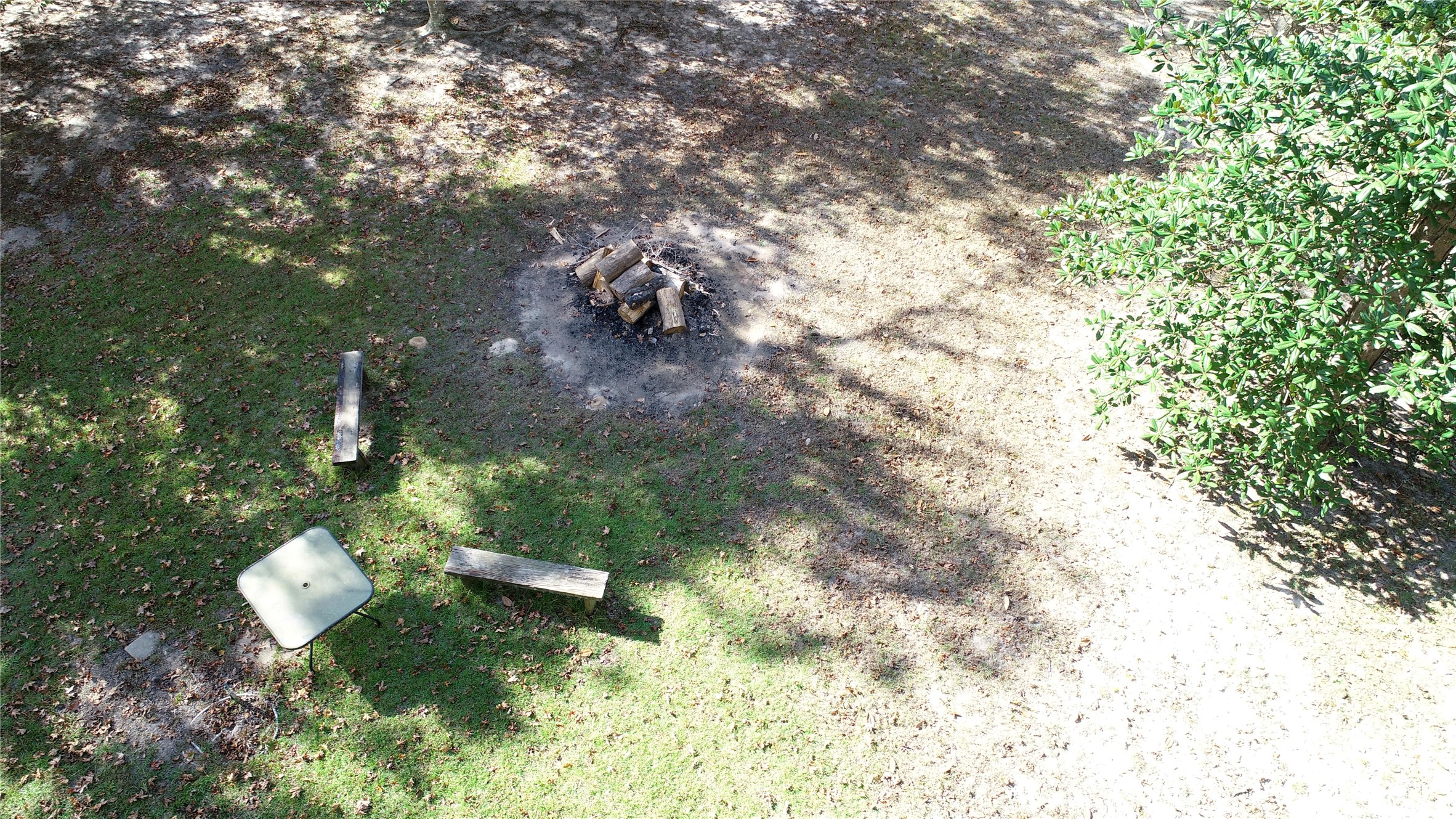 630 Hillbilly Heaven Road Livingston, TX 77351 - Photo 9 of 17 a backyard of a house with a yard and outdoor seating