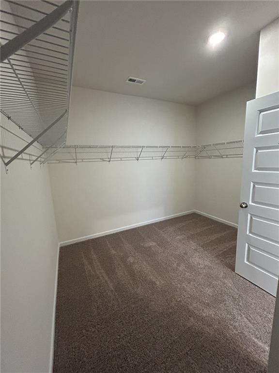 23 Whistling Oaks NE Drive Rome, GA 30165 - Photo 14 of 26 a view of a room with racks on the wall