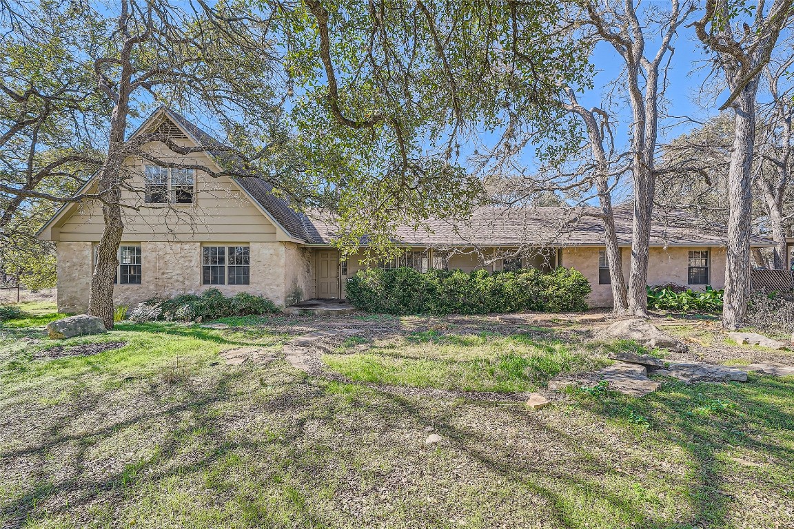 5256-5258 Bell Springs Road Dripping Springs, TX 78620 - Photo 1 of 1 a view of a house with a yard