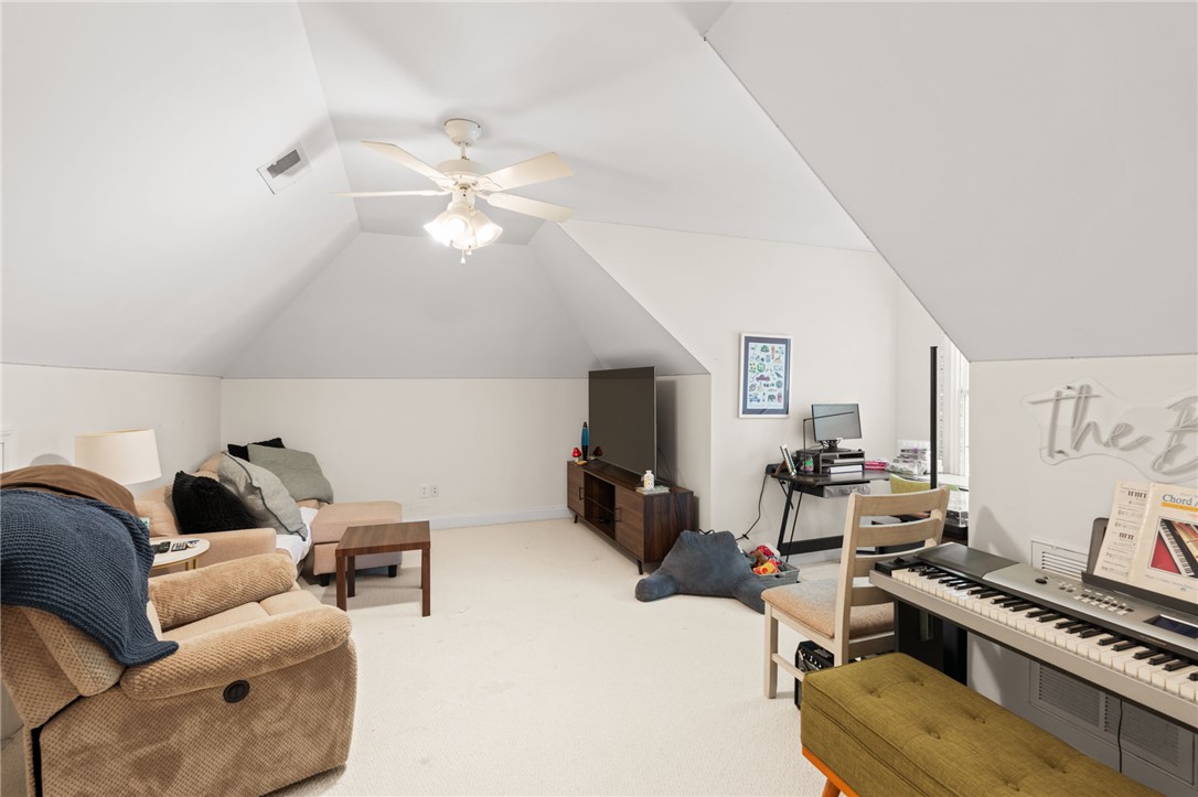 108 Winterbrook Circle Seneca, SC 29678 - Photo 29 of 40 Sloped ceilings and soft carpet define this versatile space, perfect for recreation or a private office.