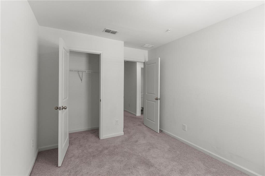 509 Magnolia Circle Palmetto, GA 30268 - Photo 16 of 24 an empty room with closet