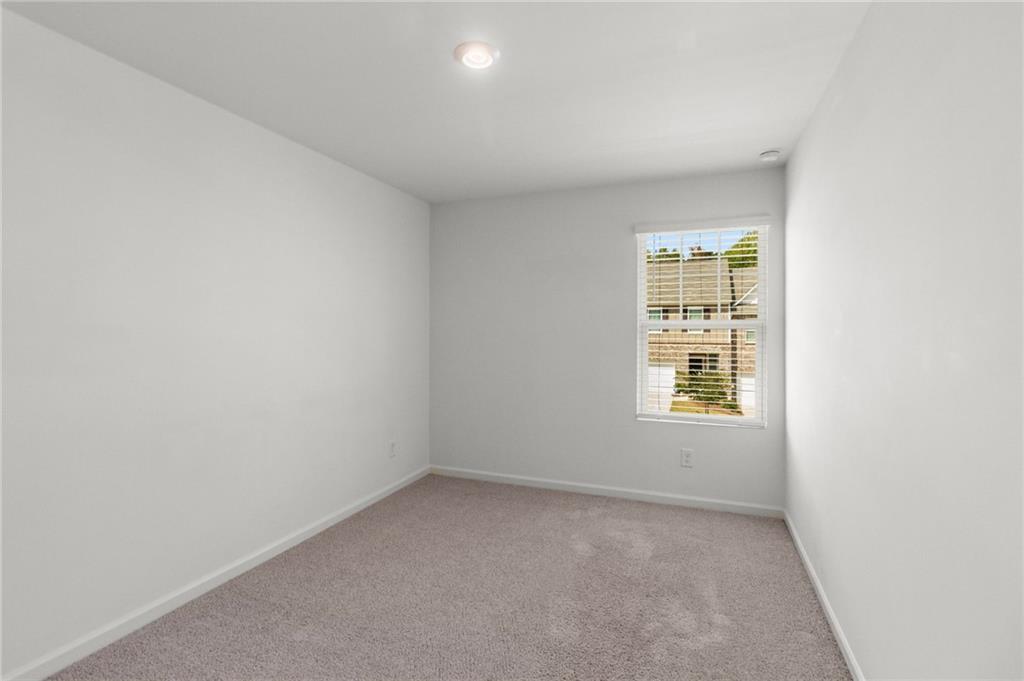 509 Magnolia Circle Palmetto, GA 30268 - Photo 17 of 24 an empty room with a window