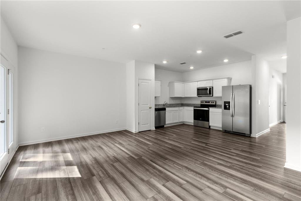 509 Magnolia Circle Palmetto, GA 30268 - Photo 7 of 24 a view of kitchen with wooden floor