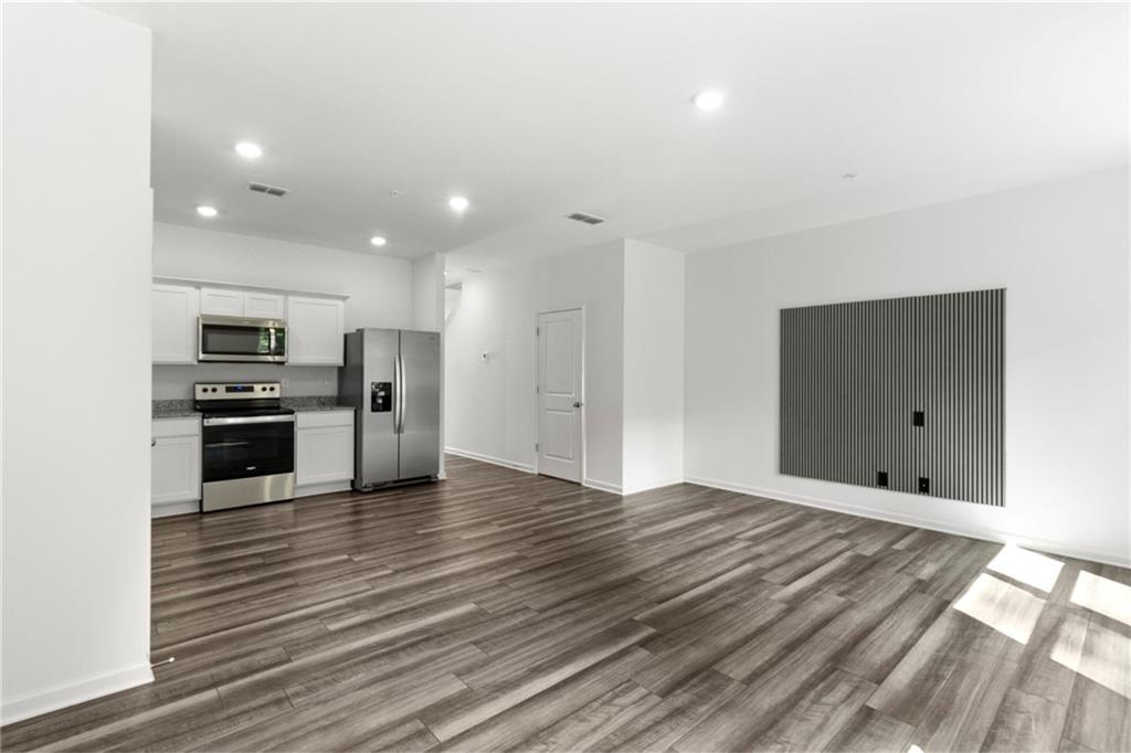 509 Magnolia Circle Palmetto, GA 30268 - Photo 9 of 24 a view of kitchen with sink stainless steel appliances and cabinets