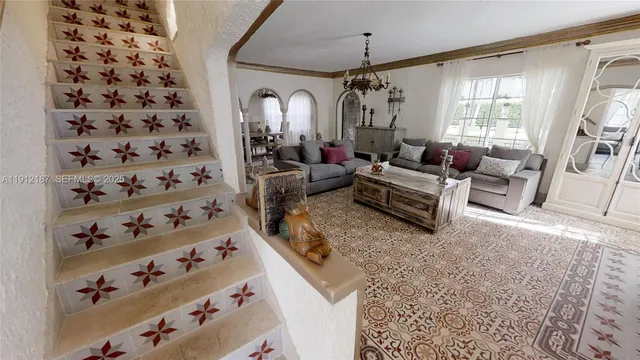 a living room with furniture and a rug