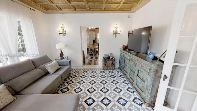 a kitchen with stainless steel appliances a sink stove and refrigerator