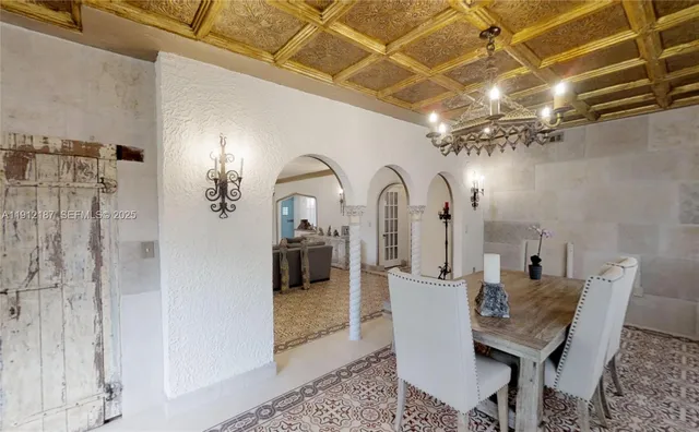 a view of a bathroom with a shower and a mirror