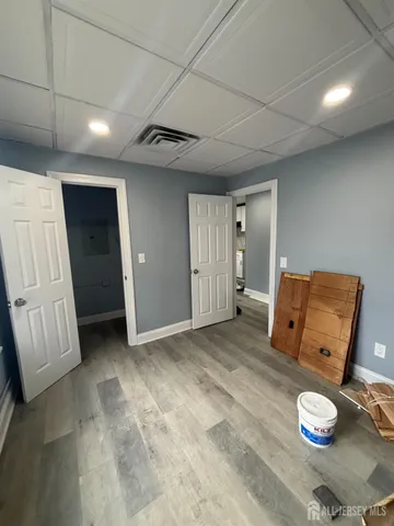 a view of livingroom with furniture and wooden floor
