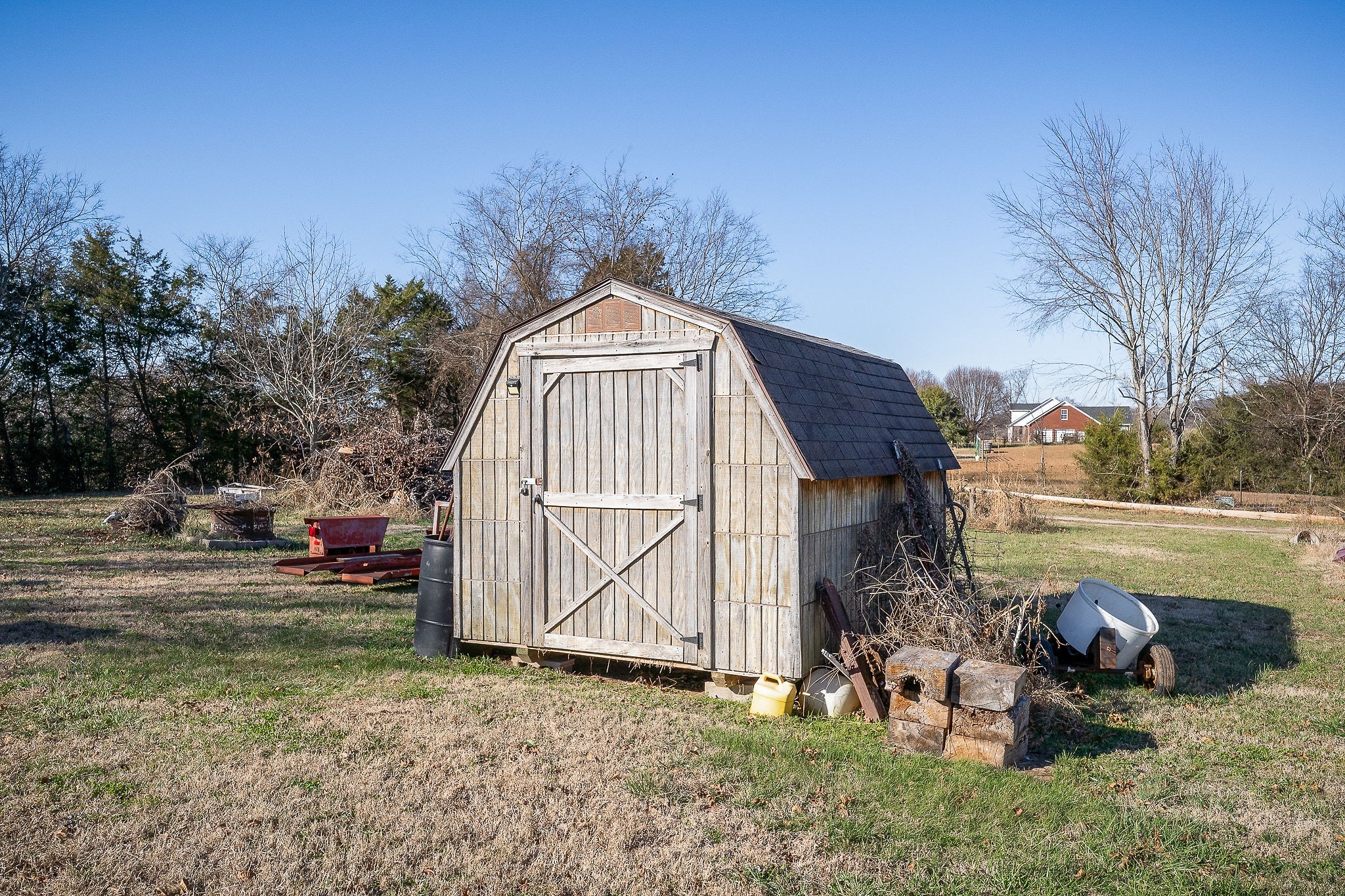 505 Thaxton Road McMinnville, TN 37110 - Photo 25 of 31 a view of a house with a yard and sitting area
