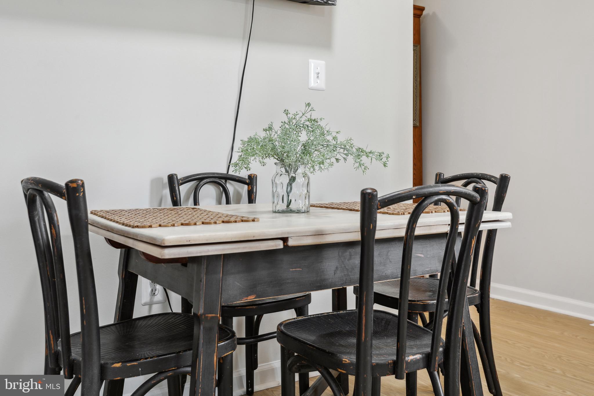 1900 Princess Anne Street, Unit 5 Fredericksburg, VA 22401 - Photo 15 of 19 a view of a dining room with furniture and window