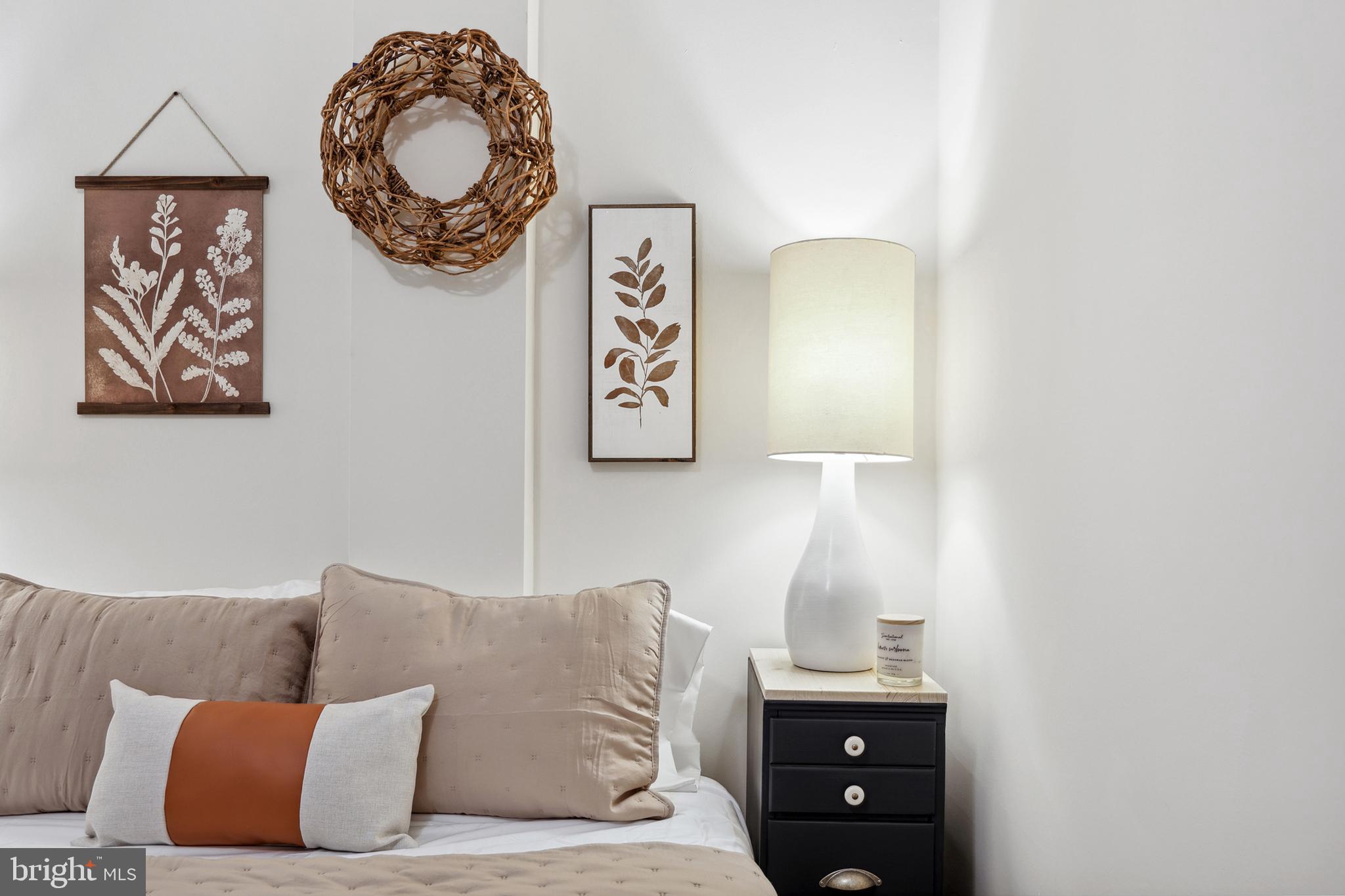 1900 Princess Anne Street, Unit 5 Fredericksburg, VA 22401 - Photo 9 of 19 a living room with a couch and a lamp