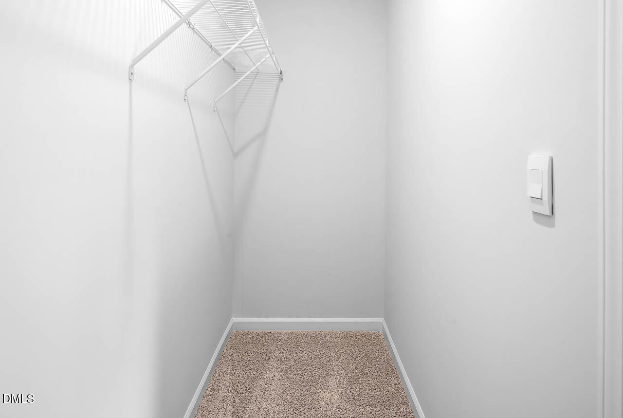 8535 Beckett Chase Way Raleigh, NC 27616 - Photo 22 of 33 a view of small space with empty racks