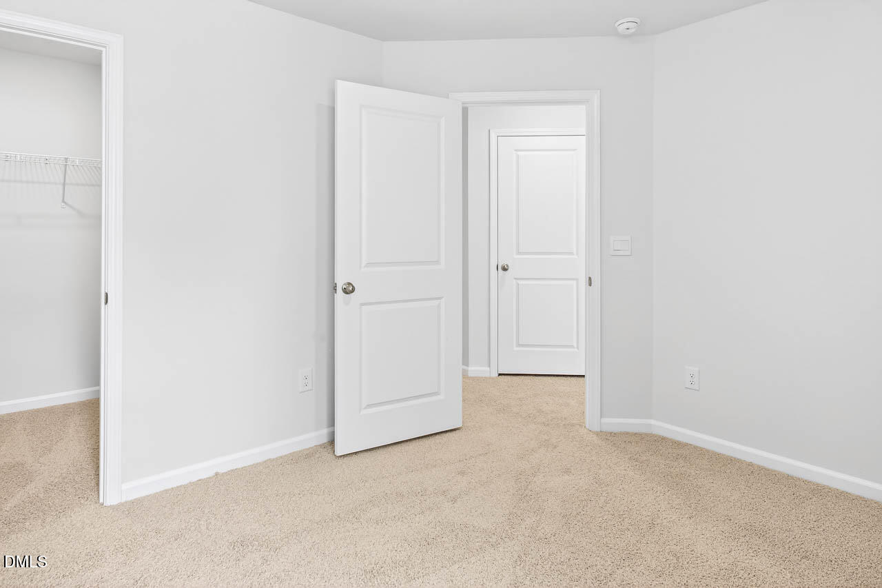 8535 Beckett Chase Way Raleigh, NC 27616 - Photo 30 of 33 an empty room with closet