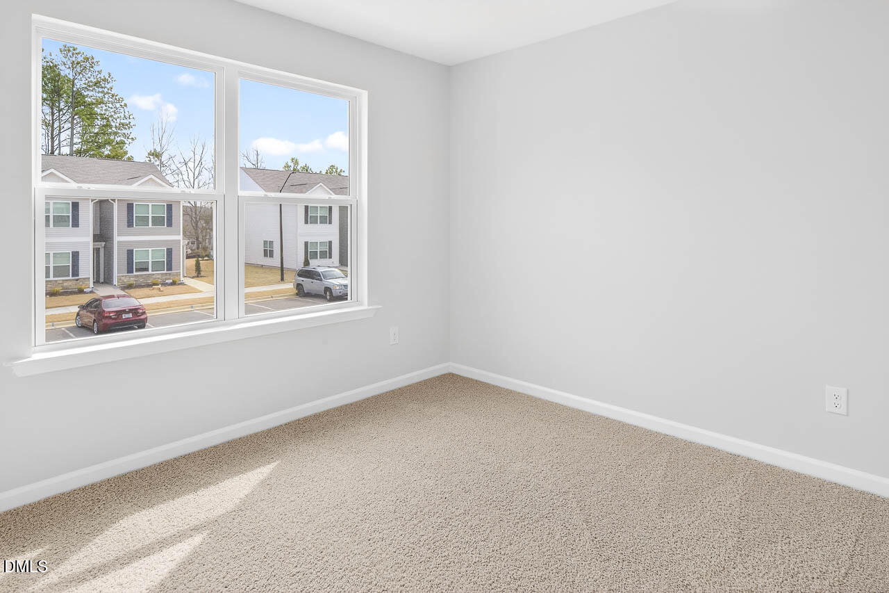 8535 Beckett Chase Way Raleigh, NC 27616 - Photo 31 of 33 an empty room with a window