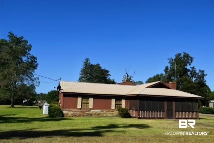 351 Cowpen Creek Road Atmore, AL 36502 - Photo 1 of 26 Exterior space with a front lawn